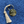 Porte Clef Médaille gravée à la main et pompon Lin