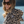 Femme souriante en poncho en coton biologique motif leopard - Atelier Dune