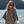 Femme souriante en poncho en coton biologique motif leopard - Atelier Dune