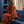 jeune fille souriante qui porte poncho de bain moelleux en coton biologique terracotta dans sa salle de bain en mosaique bleu outremer - Atelier Dune