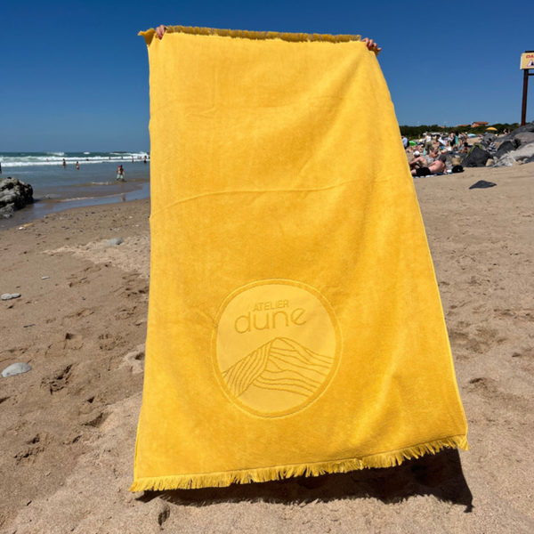 Serviette de plage double-face en coton biologique curry a la mer - Atelier Dune